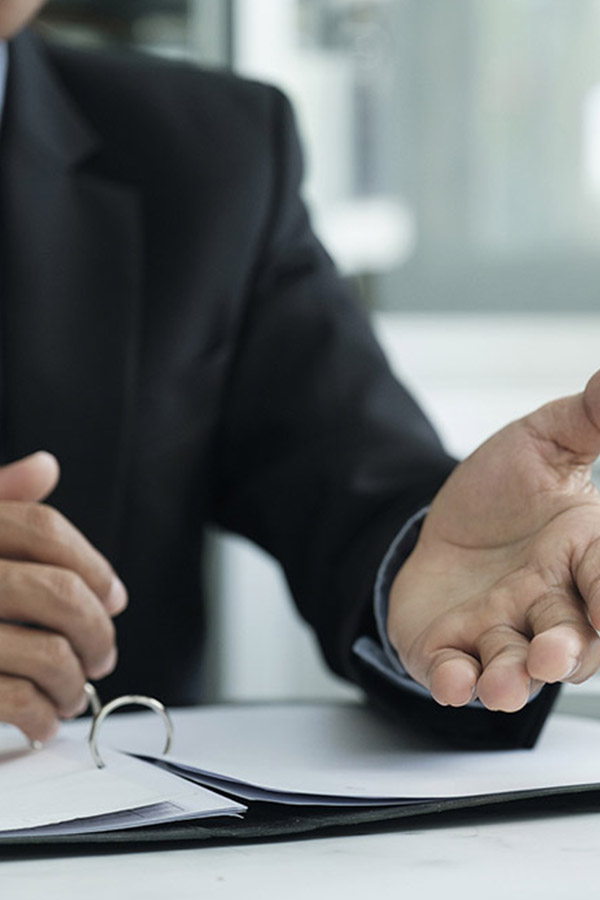 attorney is communicating with client A black and white image of a phone.