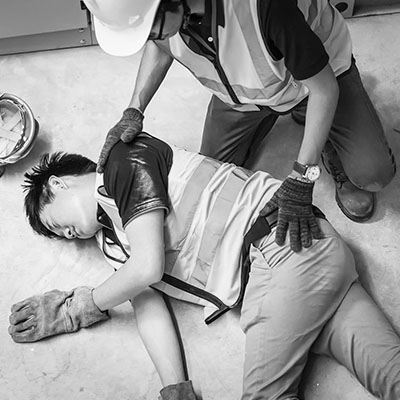 Construction Accidents picture A black and white image of a phone.