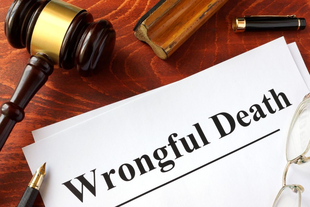 A wrongful death lawsuit is filed on the table.